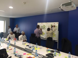 People engaging in a hands-on workshop to enhance problem-solving skills and improve critical thinking