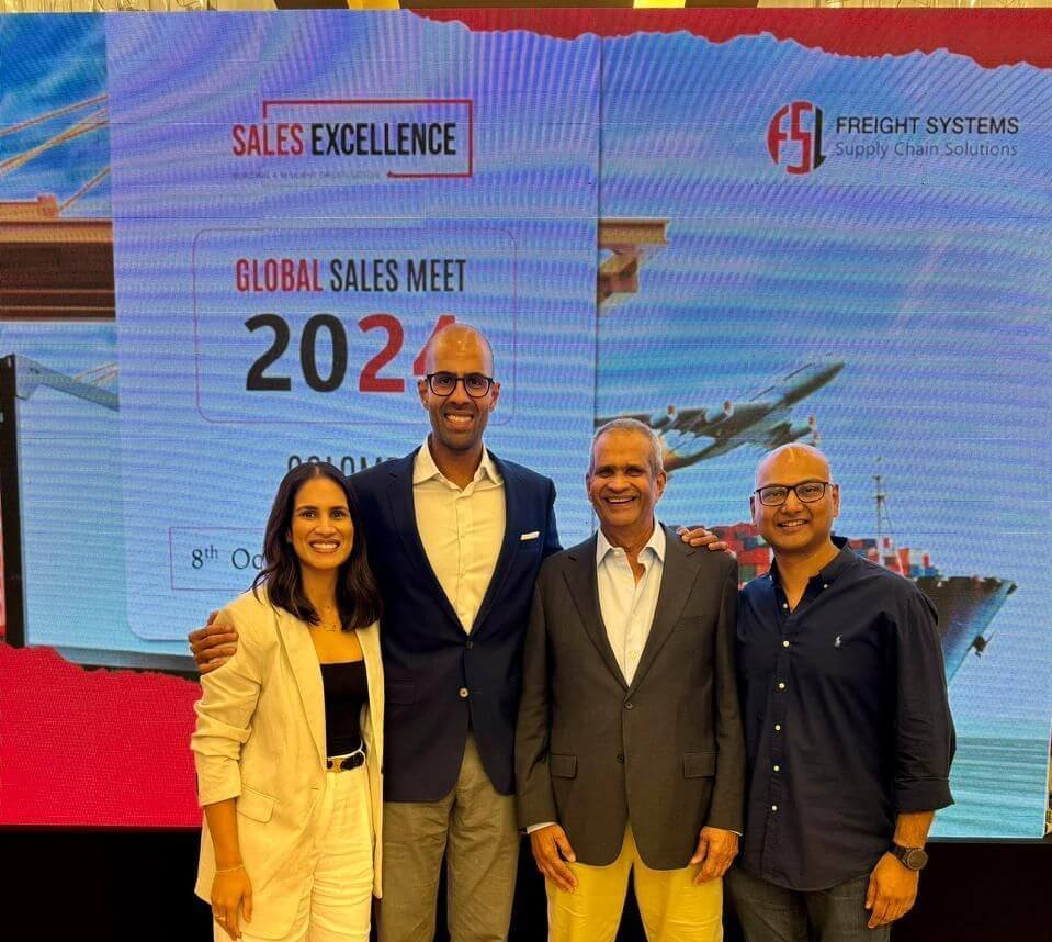 A group of leaders at a global sales event promoting inclusive leadership and diversity.