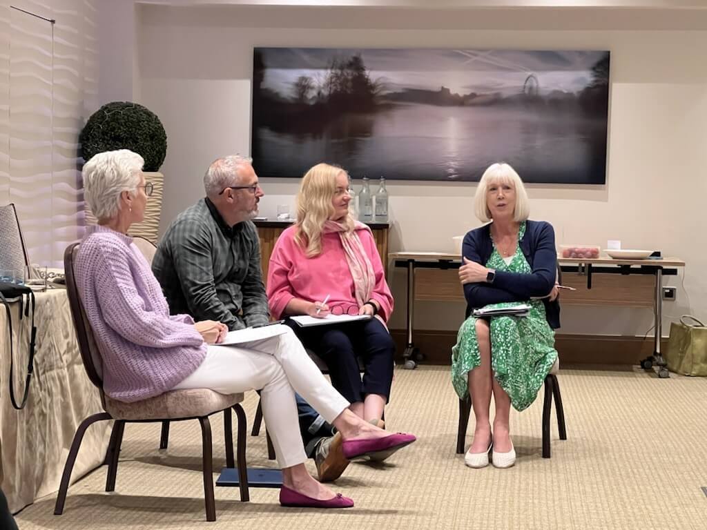 Facilitated conversation among leaders discussing how to stay grounded and lead in a world that feels out of control.