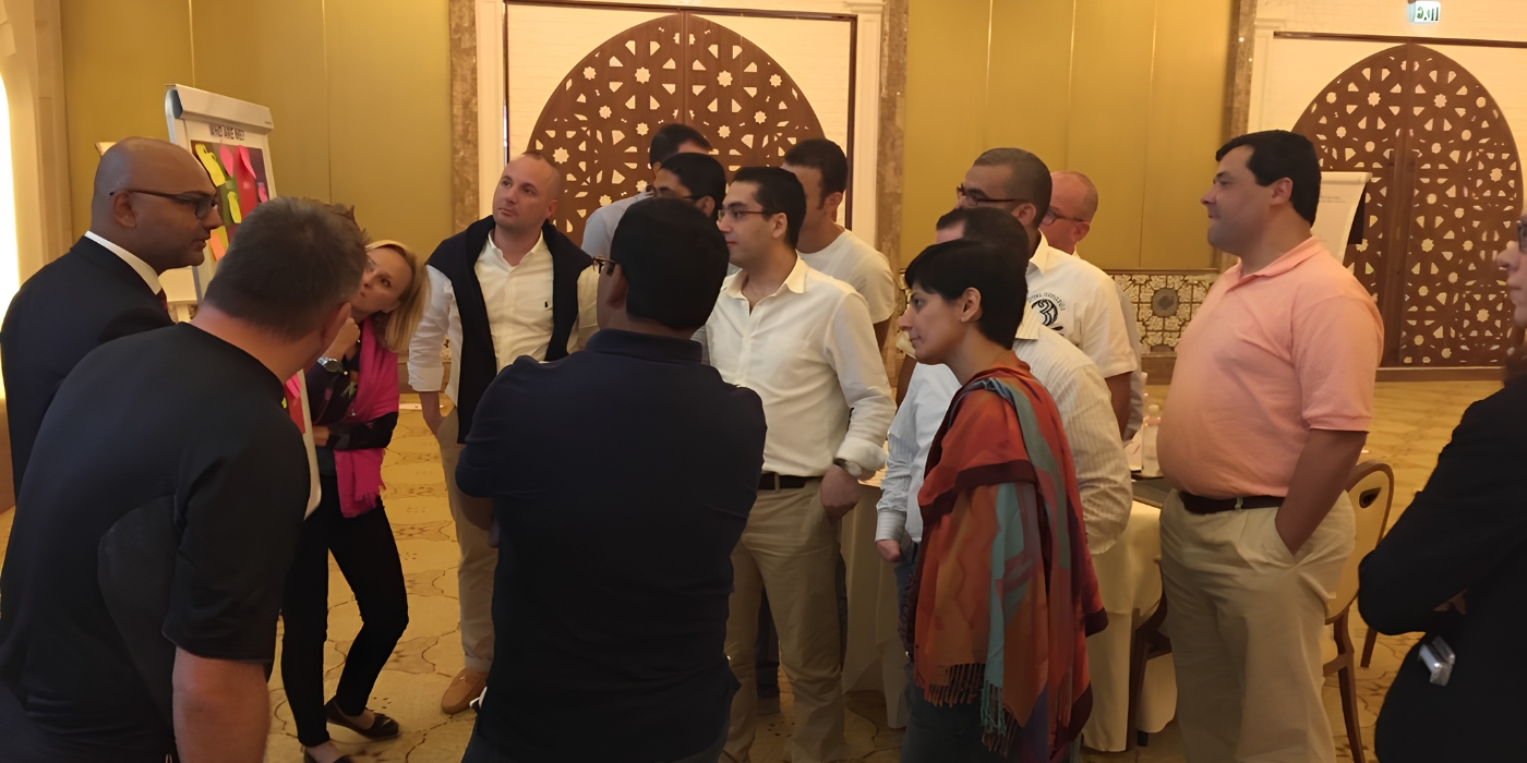 Team members discussing different types of leadership styles during a group session.