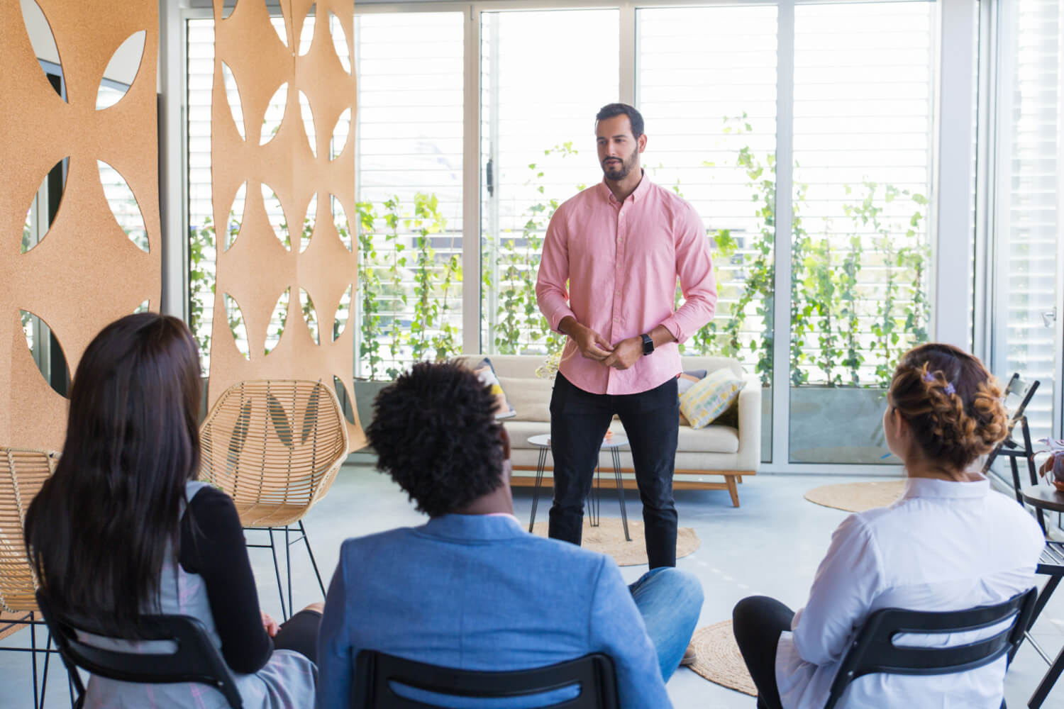 Man presenting group session on skills required for coaching