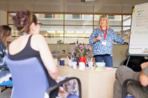 Professionals engaged in a discussion about career guidance and professional development.