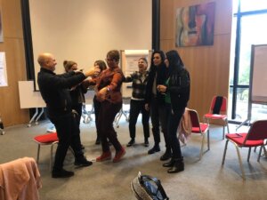 Interactive leadership training activity with participants and facilitator