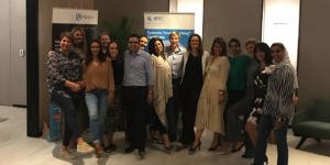Professionals strengthening negotiation skills and collaborative communication during a leadership and workplace development event