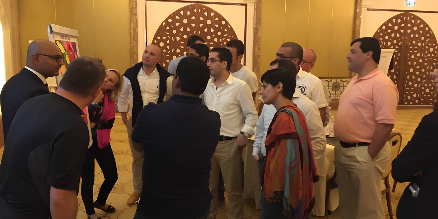 Professionals participating in a transactional leadership workshop focused on structure, accountability, and team coordination